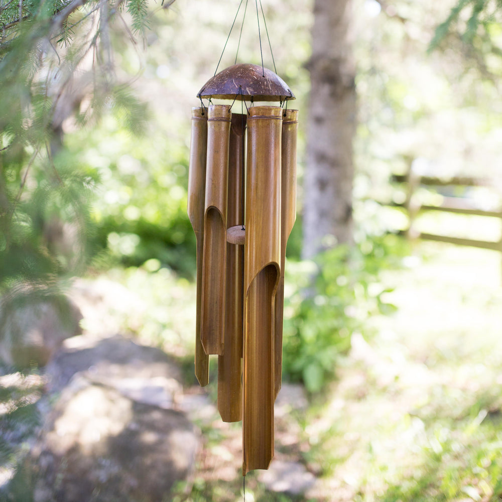 Photo of bamboo windchimes hanging in the tree