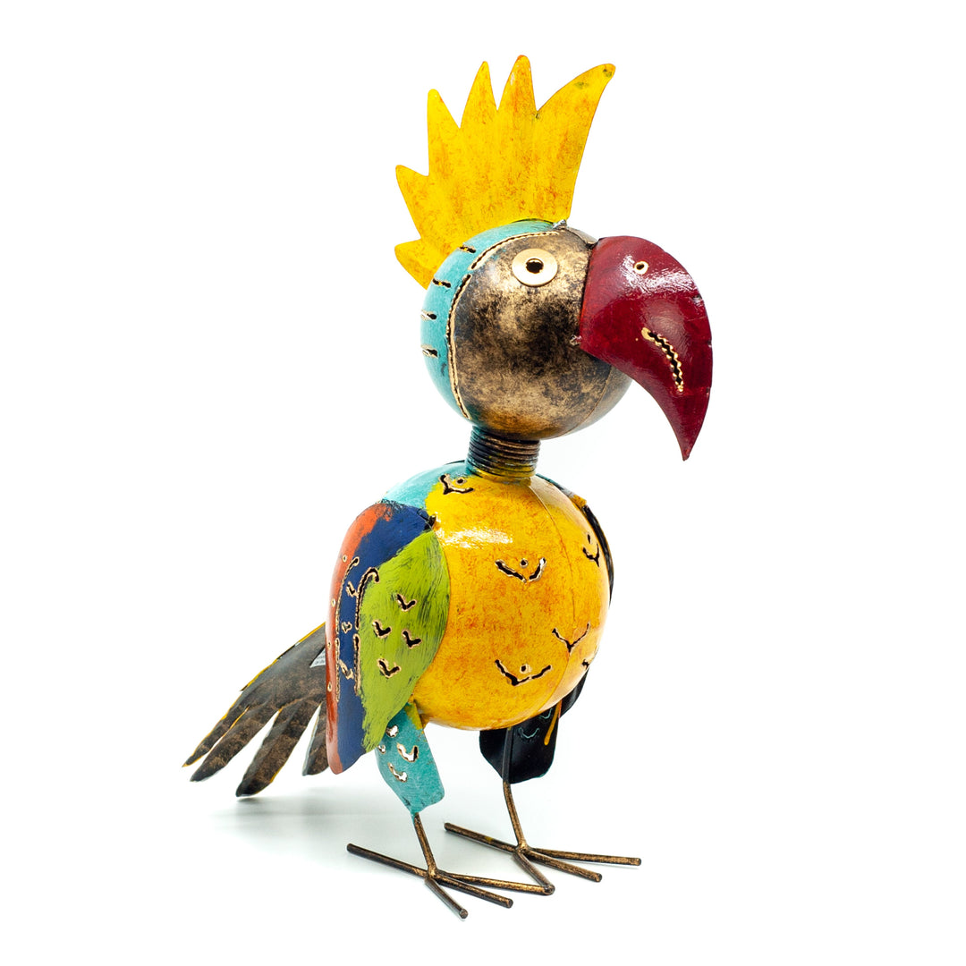 Metal cockatoo style bird in bright colours mostly yellow on white background 