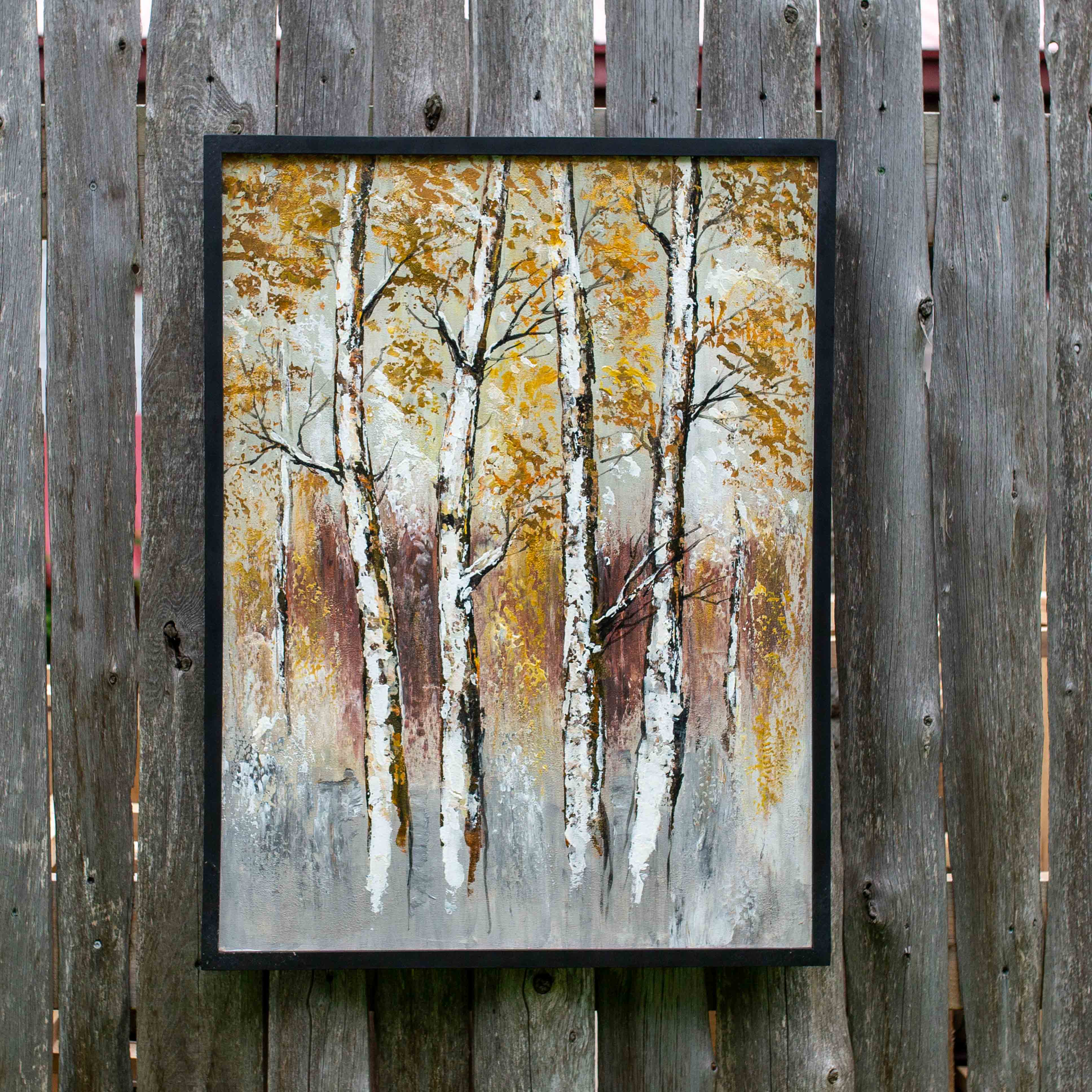 Photo of 4 distinct birch trees against a forest backdrop