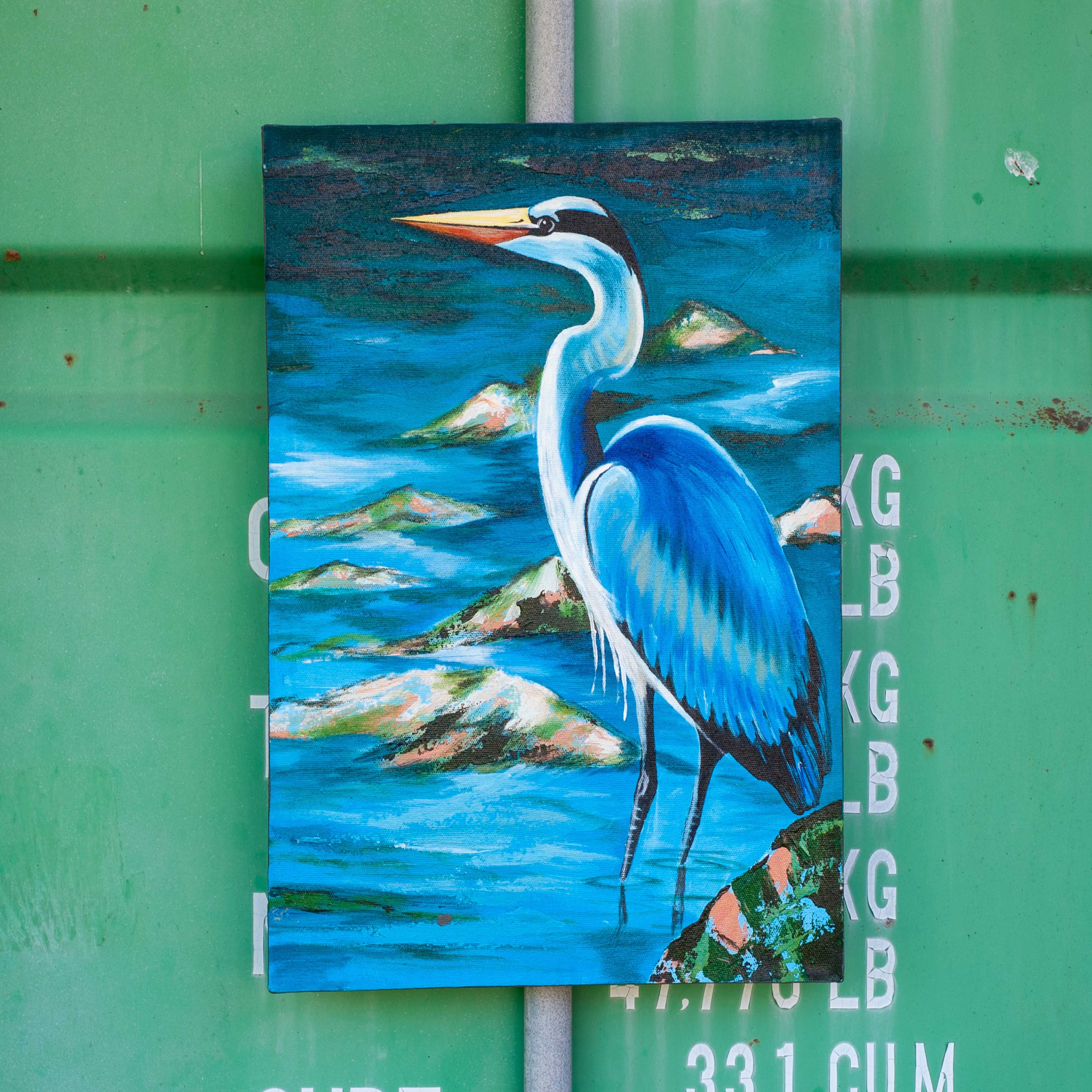 Great Blue Heron standing by the sea