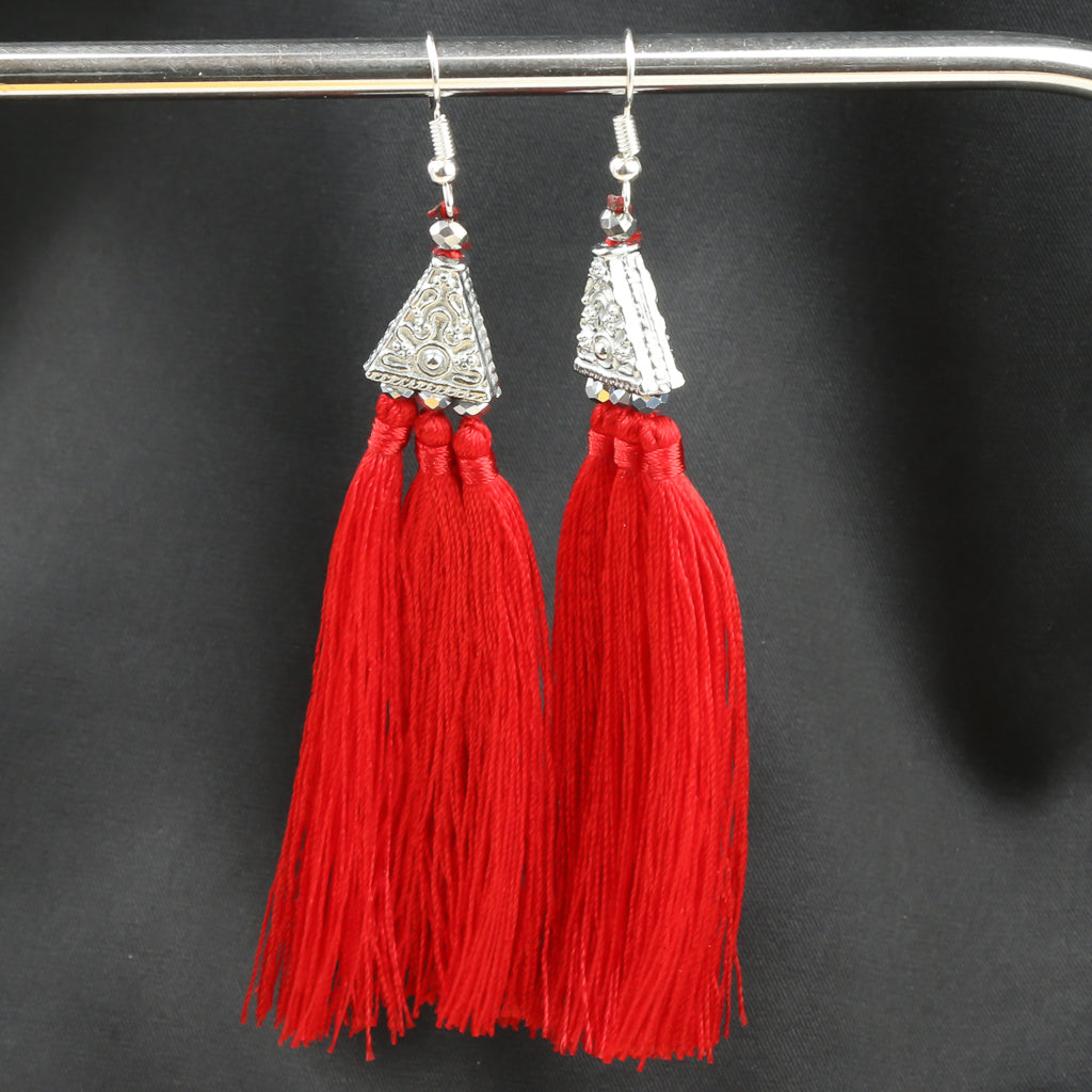 Boucles d'oreilles en argent avec pompon rouge