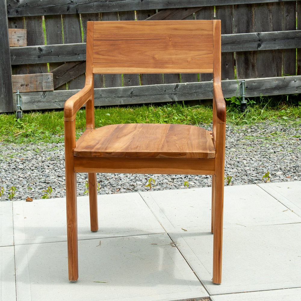 An image of a Javanese Teak Mid-Century Modern (MCM) style lounge type chair. The chair features a sleek design with clean lines and a minimalist aesthetic. Made from rich teak wood, the lounge chair showcases the natural beauty of the wood grain, creating a warm and inviting ambiance.