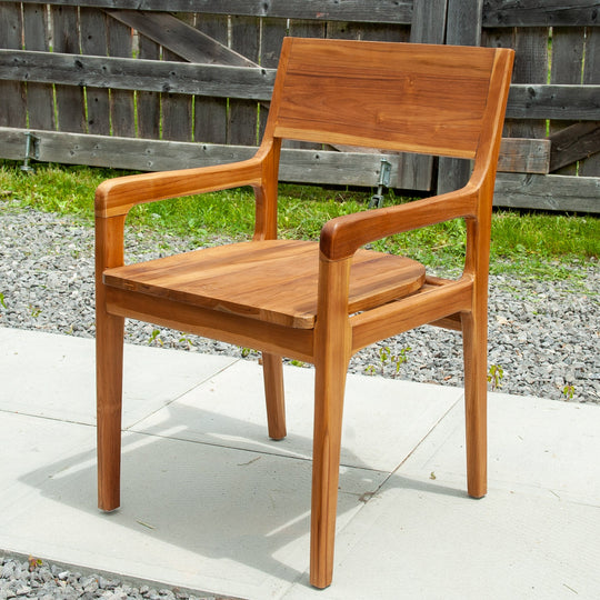 An image of a Javanese Teak Mid-Century Modern (MCM) style lounge type chair. The chair features a sleek design with clean lines and a minimalist aesthetic. Made from rich teak wood, the lounge chair showcases the natural beauty of the wood grain, creating a warm and inviting ambiance.