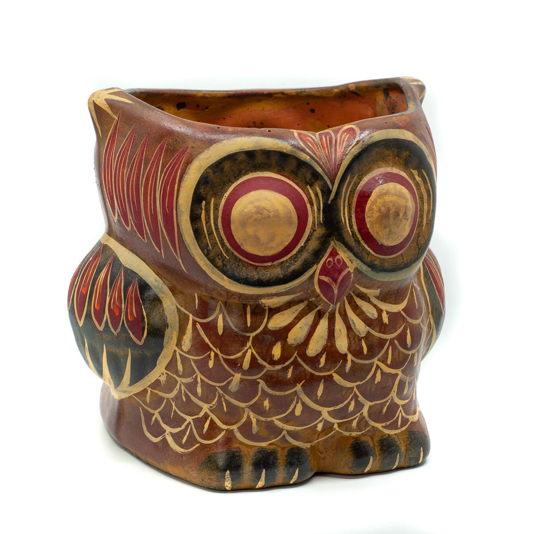 Photo of terracotta hand-painted planter in the shape of an owl 