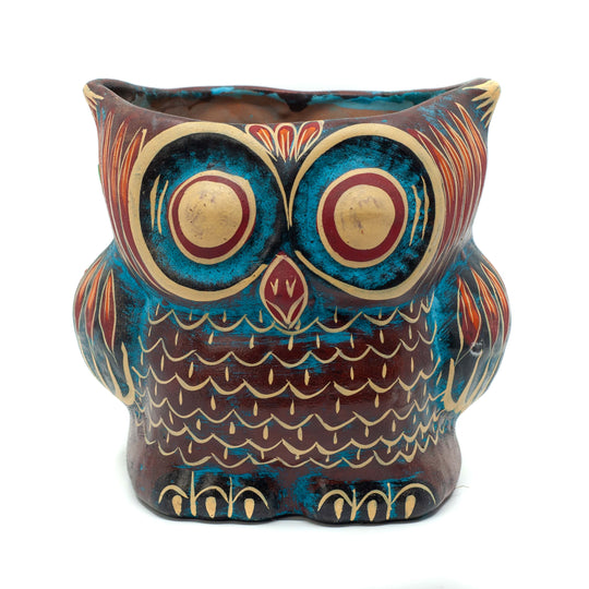 Photo of terracotta hand-painted planter in the shape of an owl 