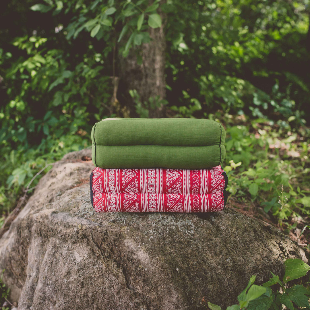 Photo of green and red yoga support cushions