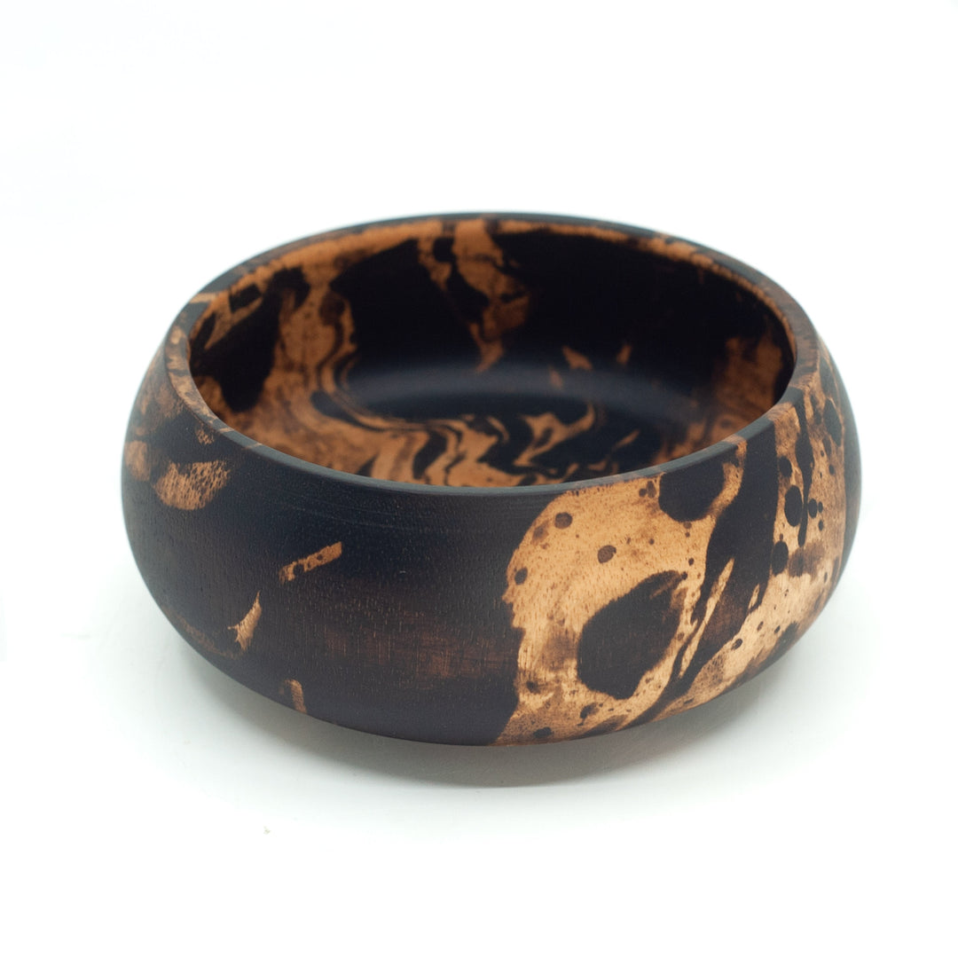 Photo of a mango wood small bowl in various colours featuring a dip dyed pattern