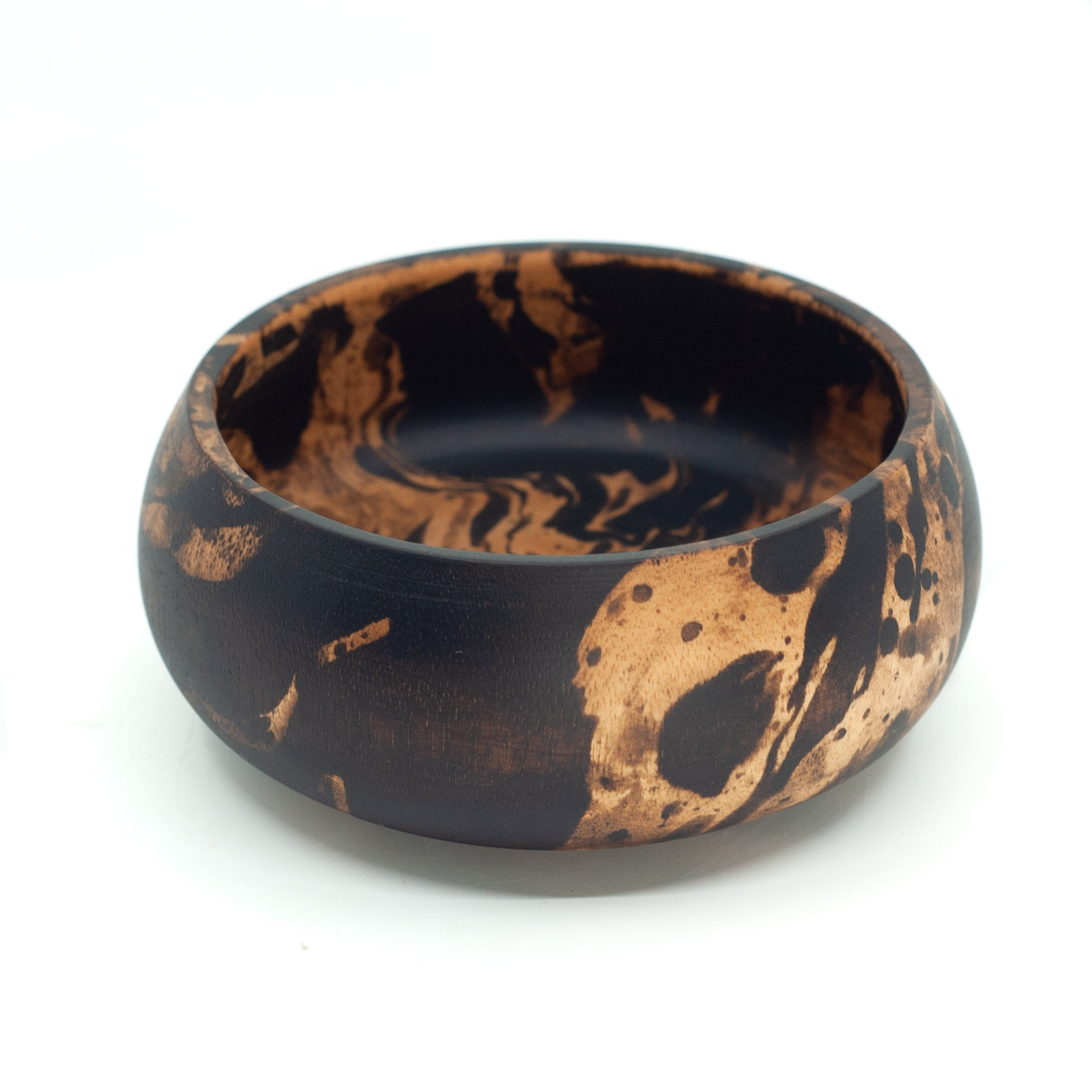 Photo of a mango wood small bowl in various colours featuring a dip dyed pattern