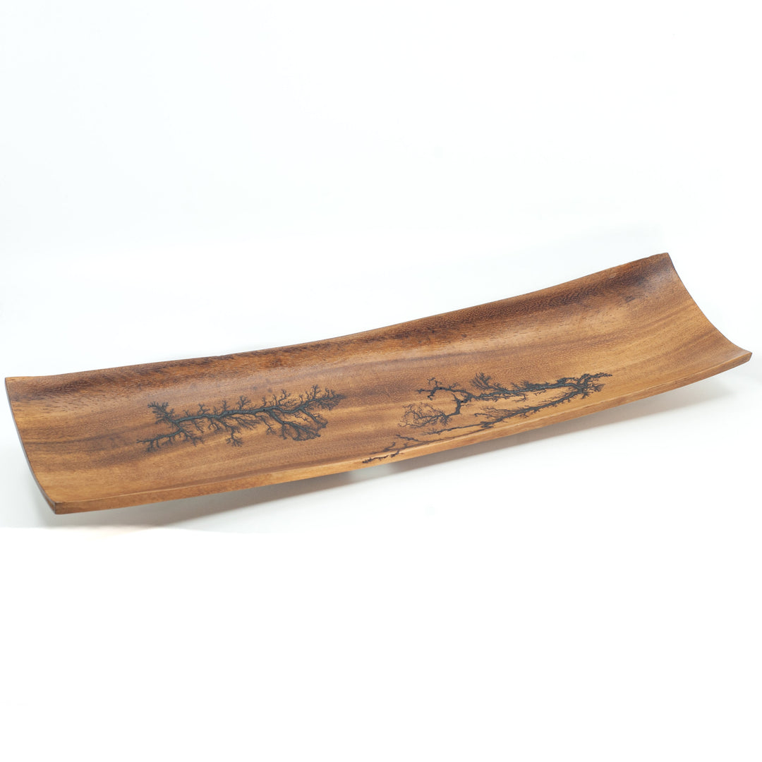 Photo of mango wood product with tree root pattern on it