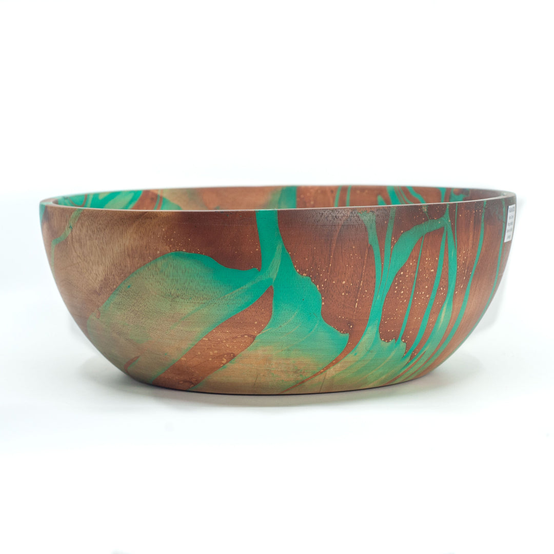 Photo of a mango wood large salad bowl in various colours featuring a dip dyed pattern