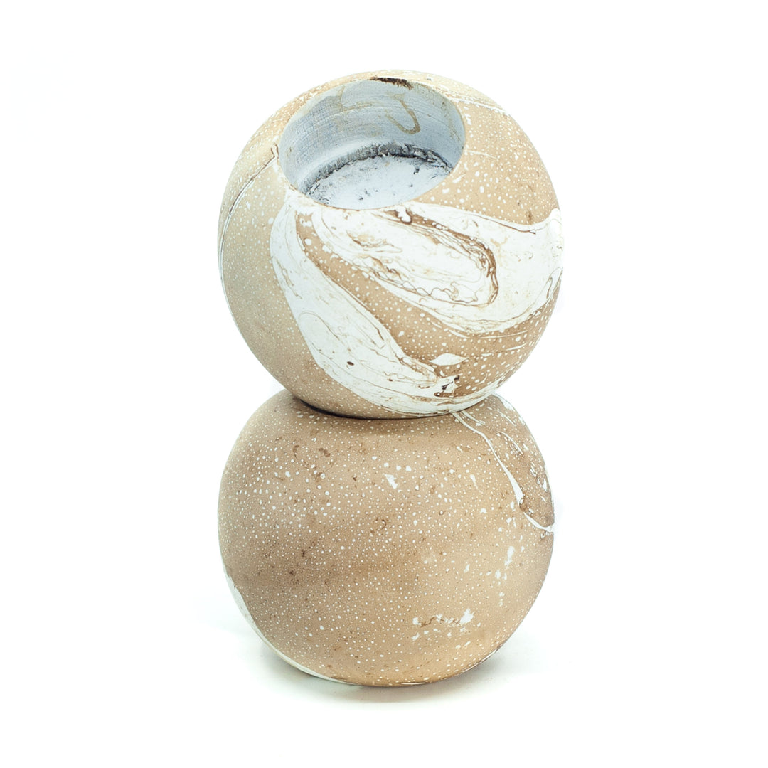 Photo of a mango wood globe like single t-lite holder in various colours featuring a dip dyed pattern