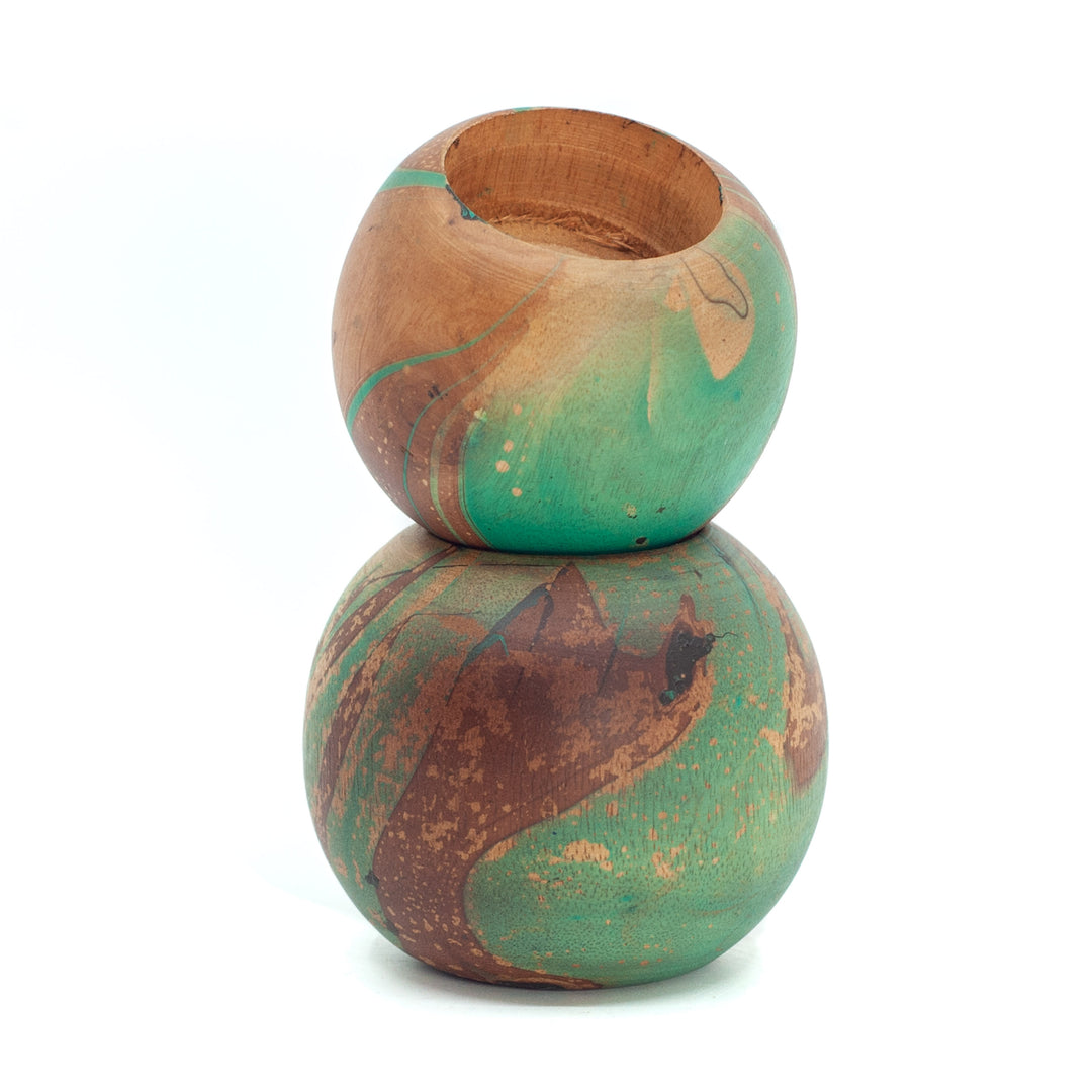 Photo of a mango wood globe like single t-lite holder in various colours featuring a dip dyed pattern