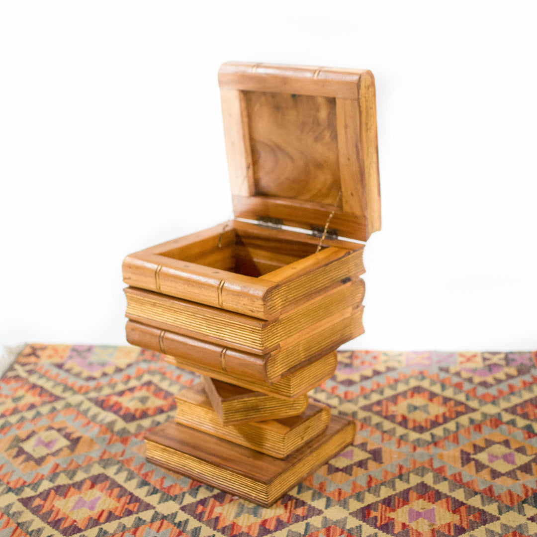 Photo of stacked book shelf style table with a storage opening on top 