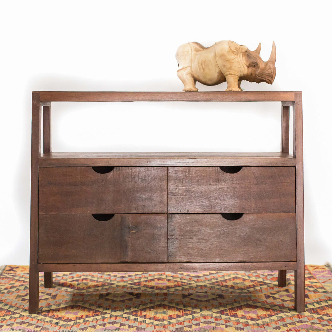 Photo of 4 drawer cabinet in a dark teak wood in an a-frame shape